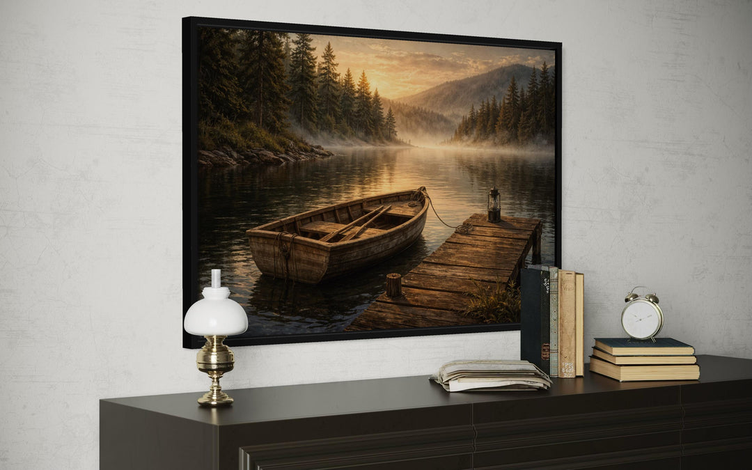 A framed canvas print of a rustic rowboat at a peaceful lake dock during a golden sunset.