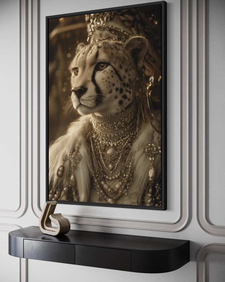 Framed canvas wall art of a cheetah in royal attire with a crown and jewels on a white paneled wall.