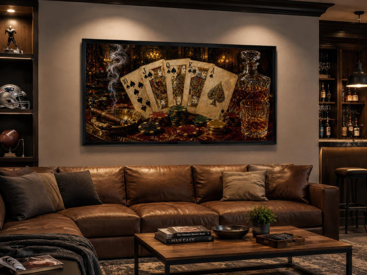 Royal Flush Poker Canvas Wall Art hanging above a leather sofa in a moody man cave setting.