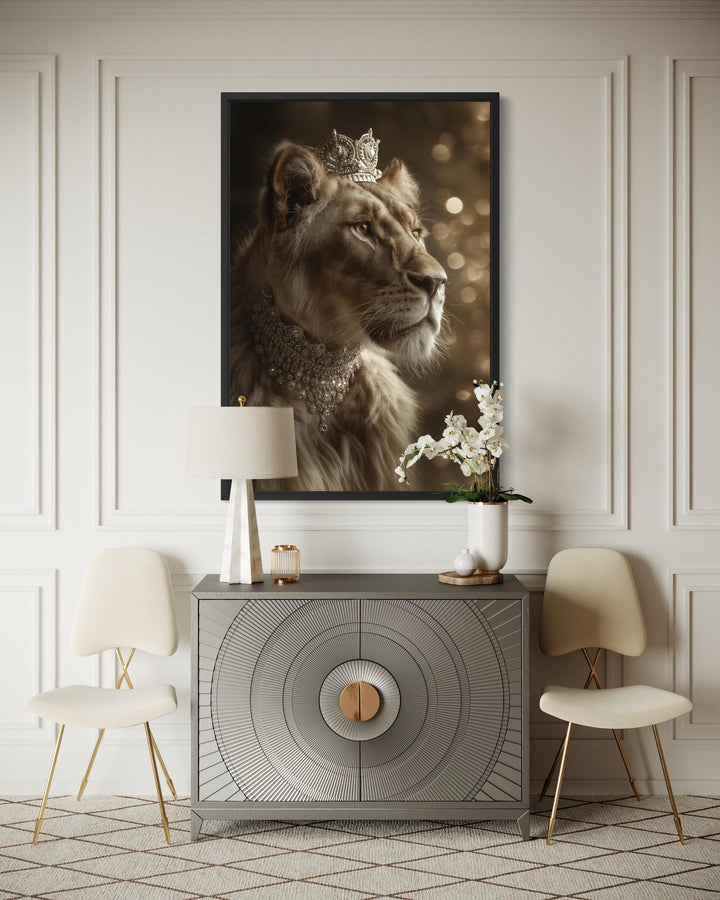 Royal Lioness Queen With Crown And Jewellery Canvas Wall Art in a black frame above a modern console.