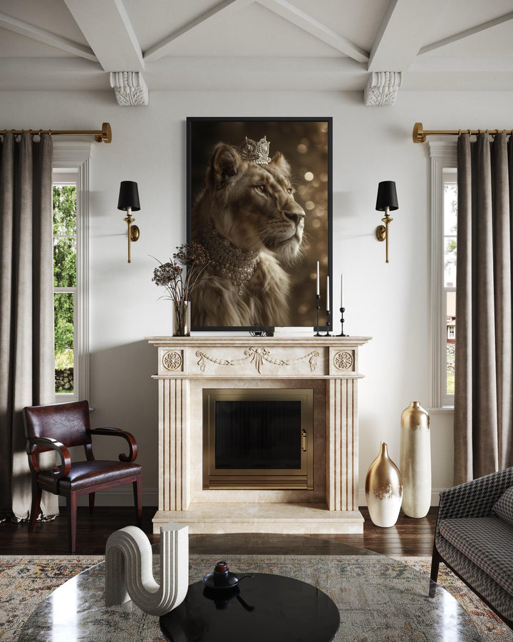A framed canvas wall art of a regal lioness wearing a crown and jewels above a marble fireplace.