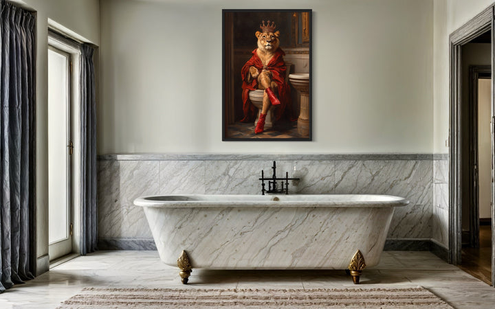 Royal Lioness With Crown Sitting on Toilet Framed Canvas Wall Art in a bathroom with a tub