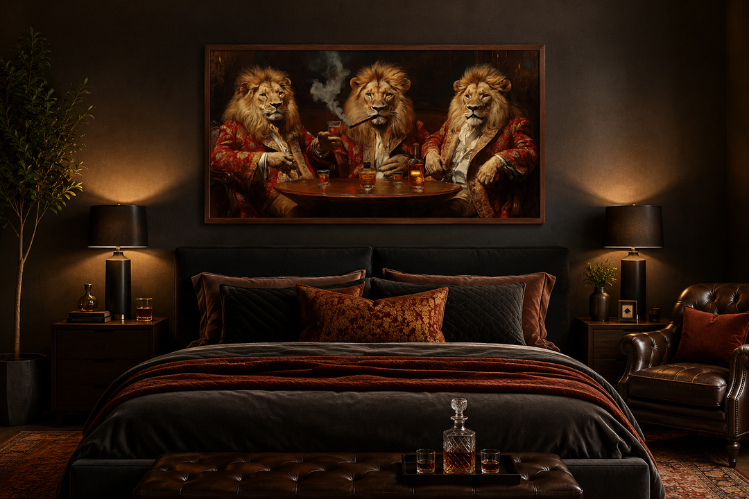 Framed canvas art of three lions in royal attire drinking whiskey and smoking cigars above a bed.