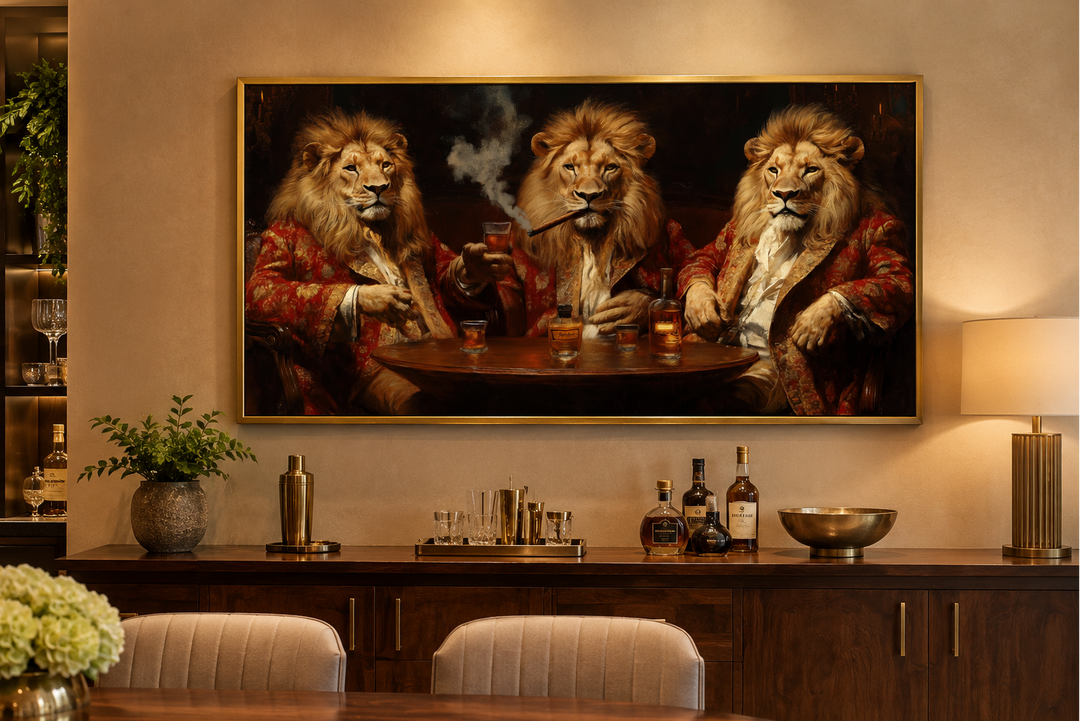 Framed canvas art of three lions in red coats drinking whiskey and smoking cigars above a home bar.