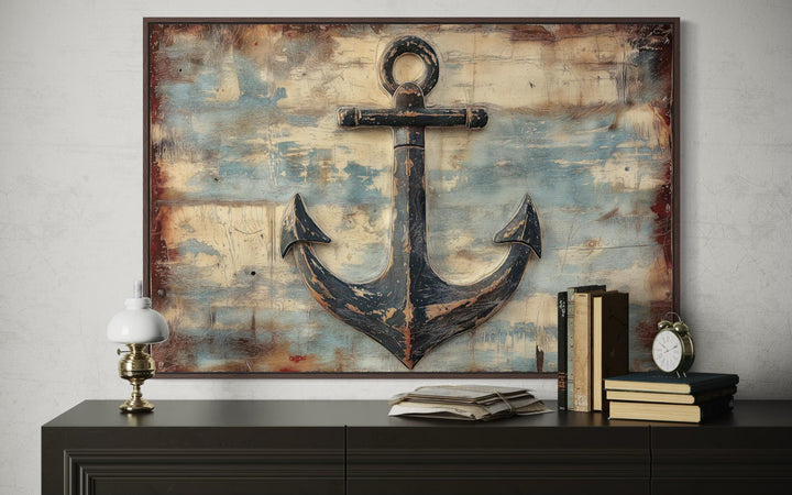 Rustic anchor wall art featuring a distressed nautical design on a weathered wood-style background.