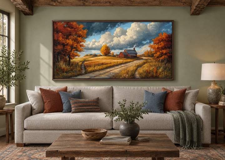 Rustic Autumn Barn Landscape Wall Art in a walnut frame above a beige sofa in a farmhouse living room
