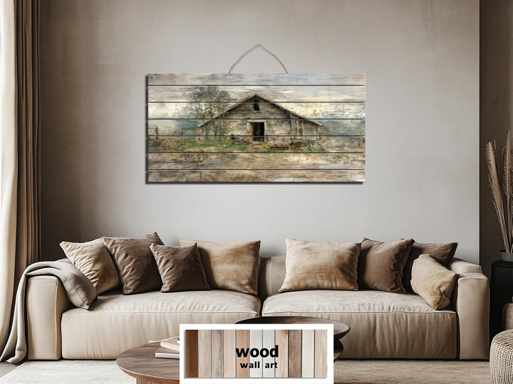 Rustic barn wall art printed on horizontal wood planks hanging above a neutral-toned sofa.