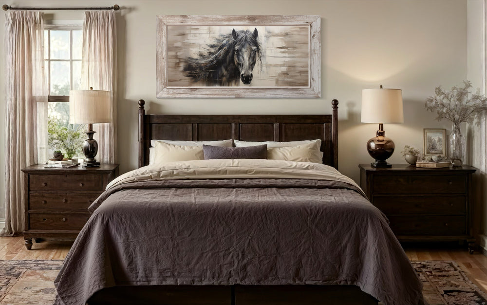 Rustic black horse painting on wood-textured canvas in a white frame above a dark wood bed.