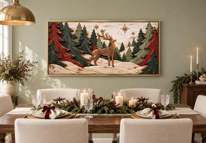 Rustic Christmas deer and evergreen trees framed canvas wall art above a decorated dining table.