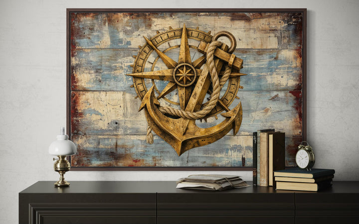 Rustic compass and anchor on blue wood canvas wall art for nautical home decor.