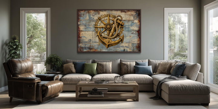 Rustic compass and anchor on blue wood canvas wall art displayed above a sofa in a living room.