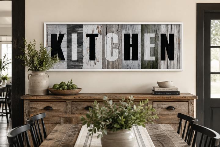 Rustic farmhouse kitchen sign canvas wall decor with bold black and white lettering on wood planks.