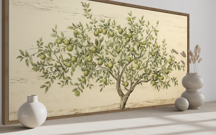Rustic farmhouse wall art featuring a green apple tree on a textured canvas with a wooden frame.