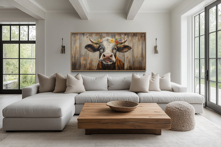 Rustic farmhouse wall art featuring a curious cow painting on a wood framed canvas print.