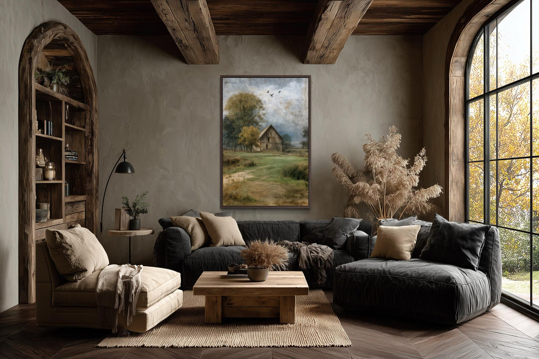 Vertical canvas print of a rustic barn in a peaceful countryside landscape on a neutral wall.