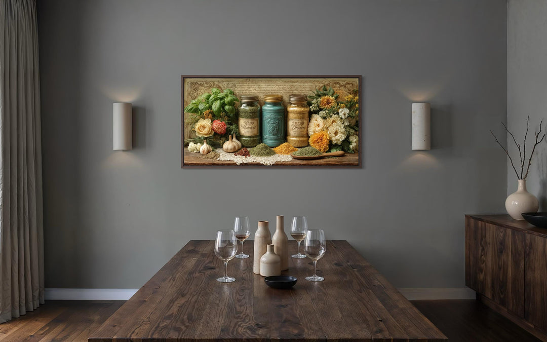 A horizontal canvas print of herbs and spices hangs in a rustic dining room with a wooden table.