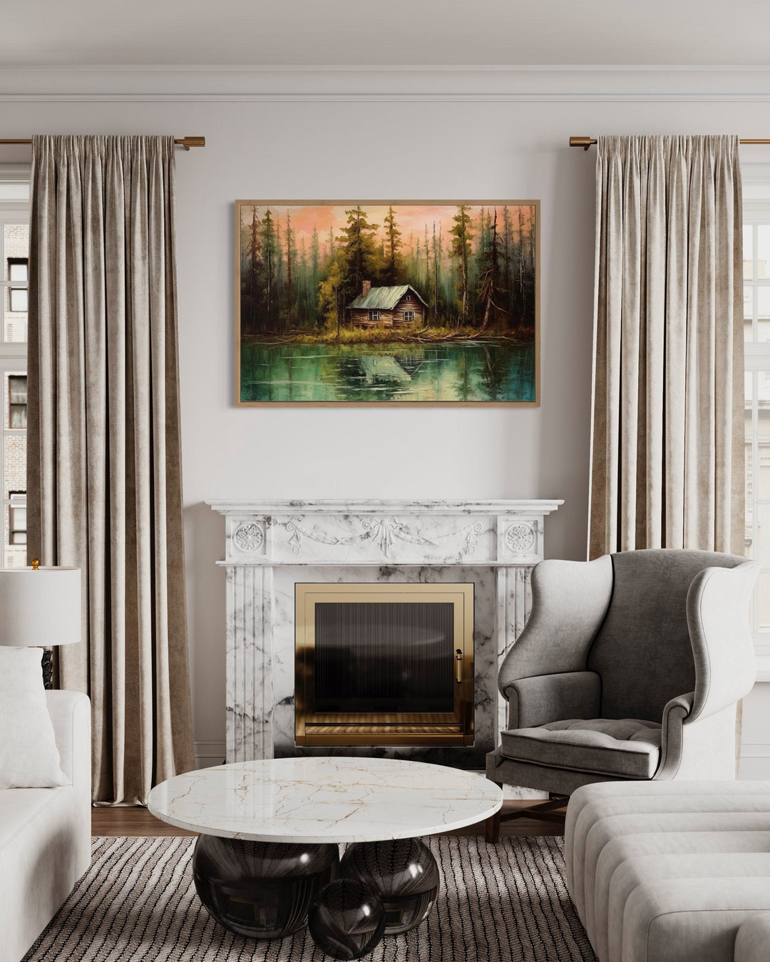 Rustic lake and cabin framed canvas wall art hanging above a marble fireplace in a living room.