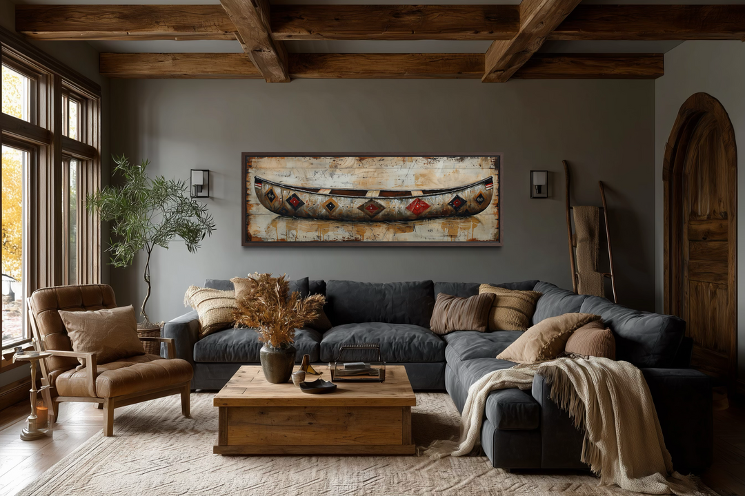 Rustic old wooden canoe painting on wood framed canvas wall art in a cozy living room.