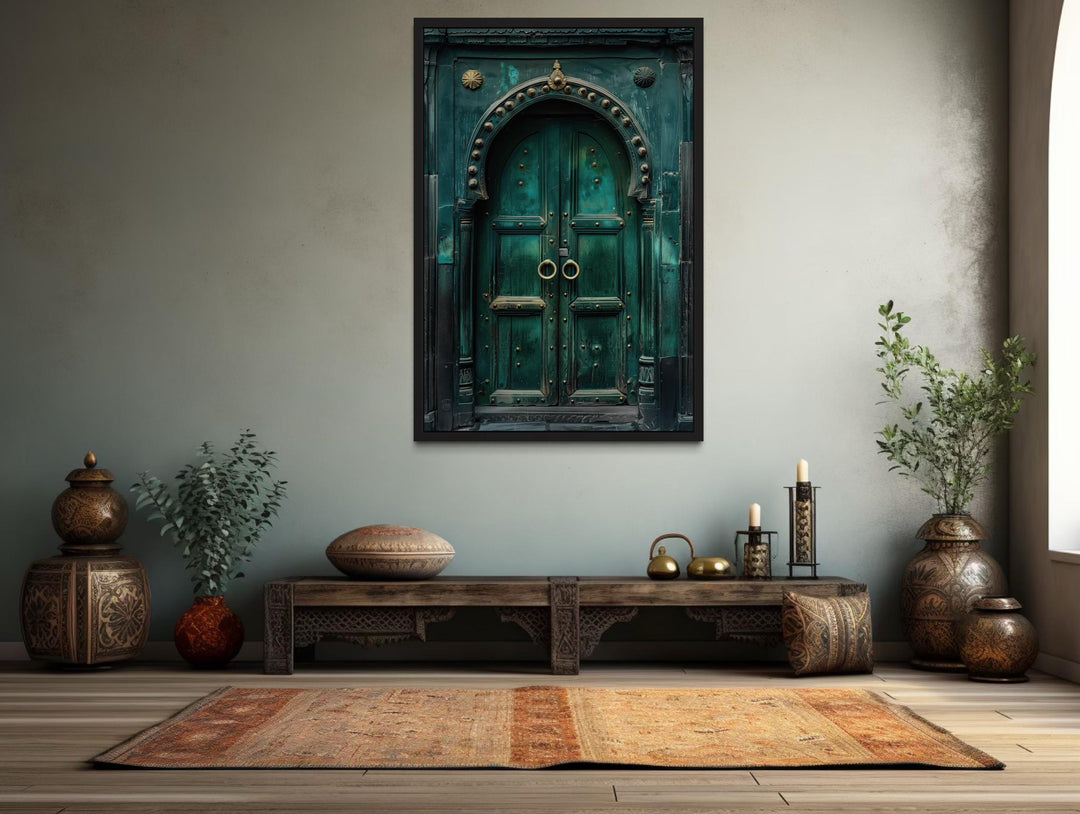 Rustic teal vintage Indian door canvas wall art in a black frame above a wooden bench.