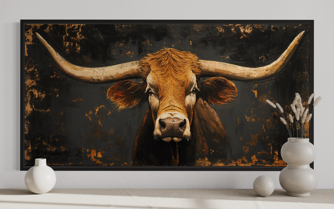 Extra large framed wall art of a rustic Texas longhorn cow with a dark, textured background.