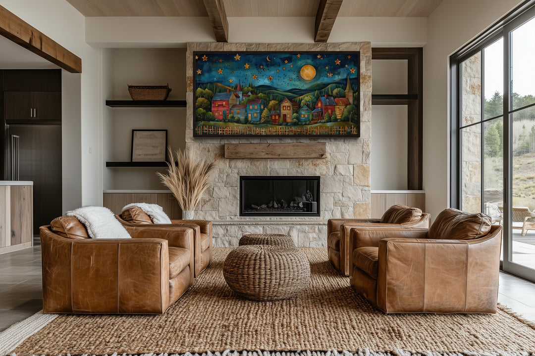 Rustic village wall art featuring a night sky with stars and moon above a stone fireplace mantel.