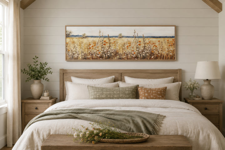 Horizontal canvas wall art featuring a rustic vintage field of yellow and orange wildflowers.