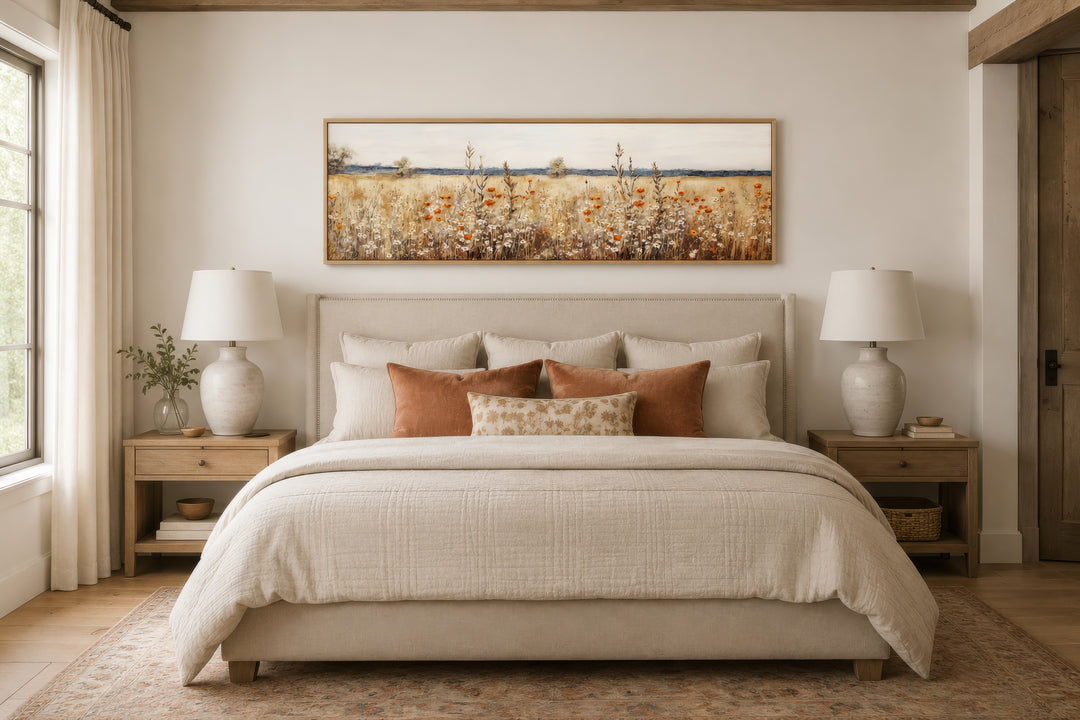 Horizontal canvas wall art featuring a rustic vintage field of yellow and orange wildflowers.