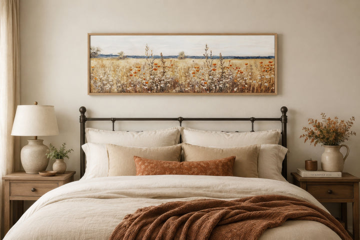 Rustic vintage yellow wildflowers field horizontal canvas wall art hanging above a bed.