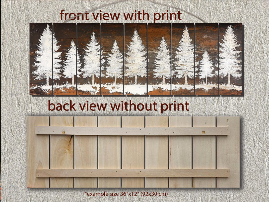 Rustic white pine tree silhouettes printed on a long, narrow distressed wood plank wall art piece.