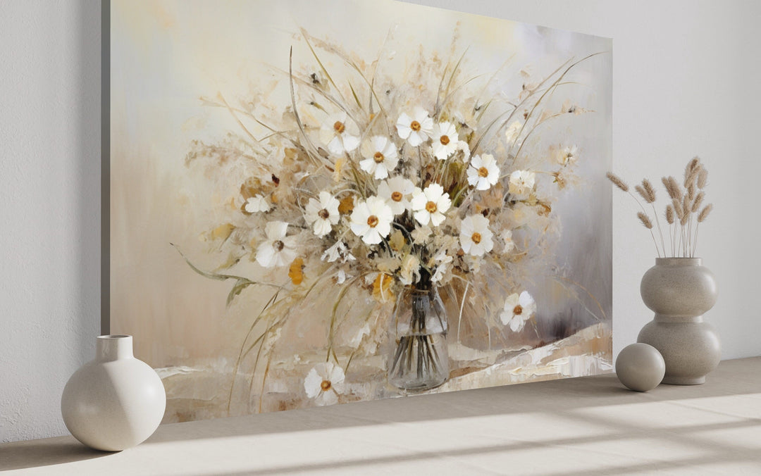 Rustic white wildflowers bouquet framed canvas wall art in a neutral-toned farmhouse setting.