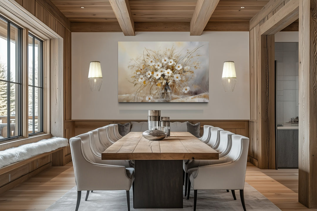 Rustic white wildflowers bouquet framed canvas wall art in a neutral-toned farmhouse dining room.