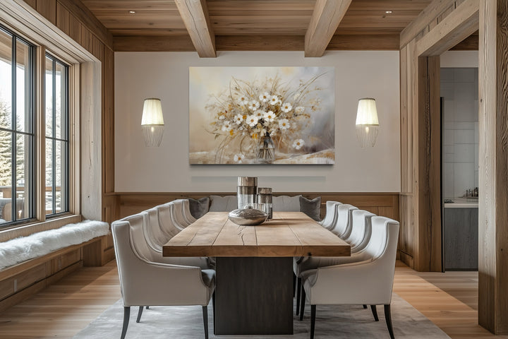 Rustic white wildflowers bouquet framed canvas wall art in a neutral-toned farmhouse dining room.
