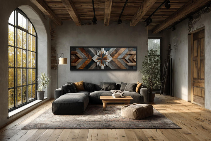 Long horizontal canvas wall art featuring a rustic geometric chevron pattern in varied wood tones.