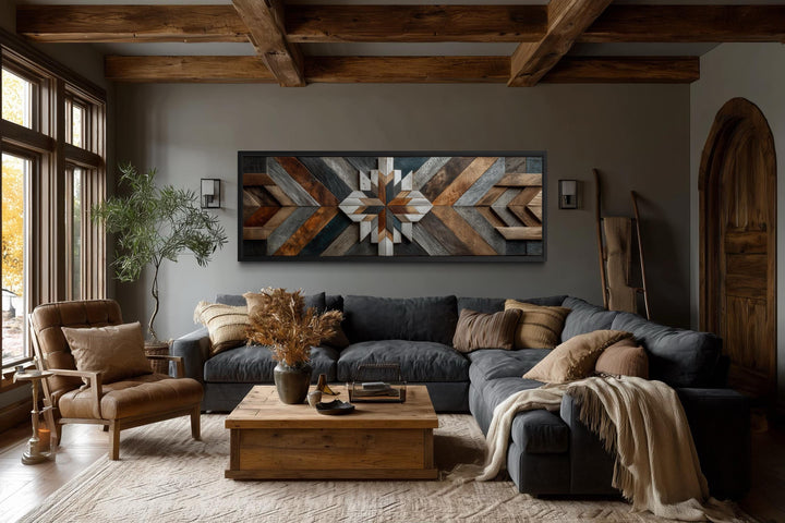 A long horizontal canvas wall art featuring a rustic geometric chevron pattern in wood-tone colors.