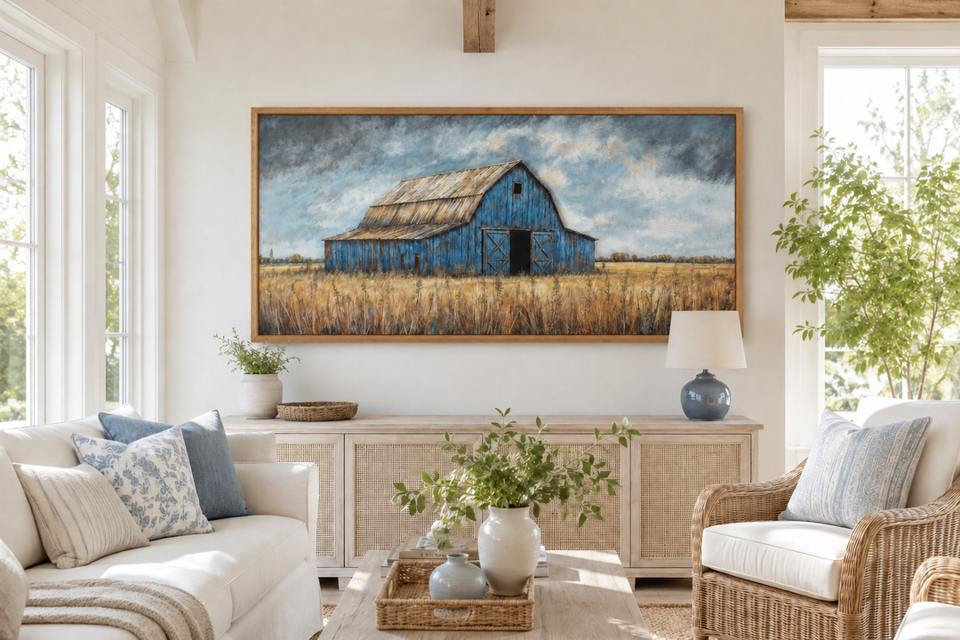 Rustic blue barn framed canvas wall art hanging above a sideboard in a farmhouse living room.