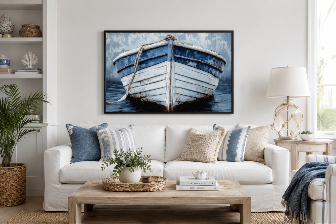 Rustic boat front view blue and white distressed coastal wall art above a white sofa in a living room