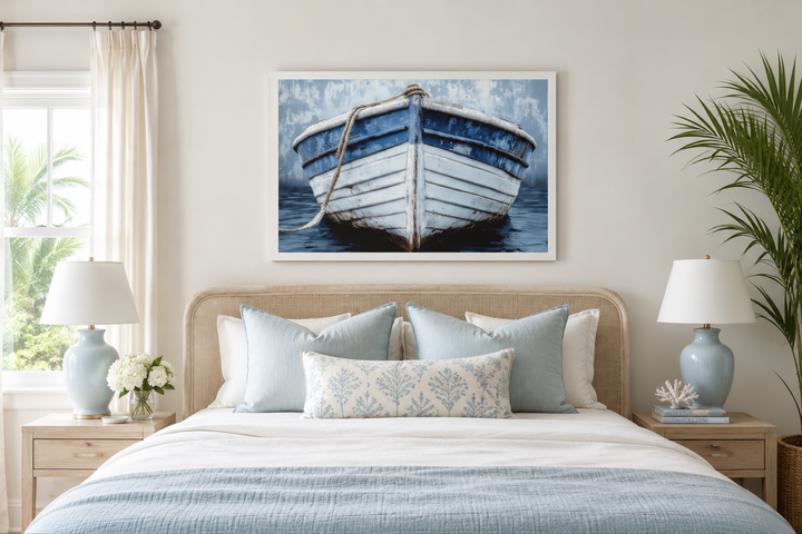 Rustic blue and white distressed boat wall art hanging above a bed in a coastal-style bedroom.