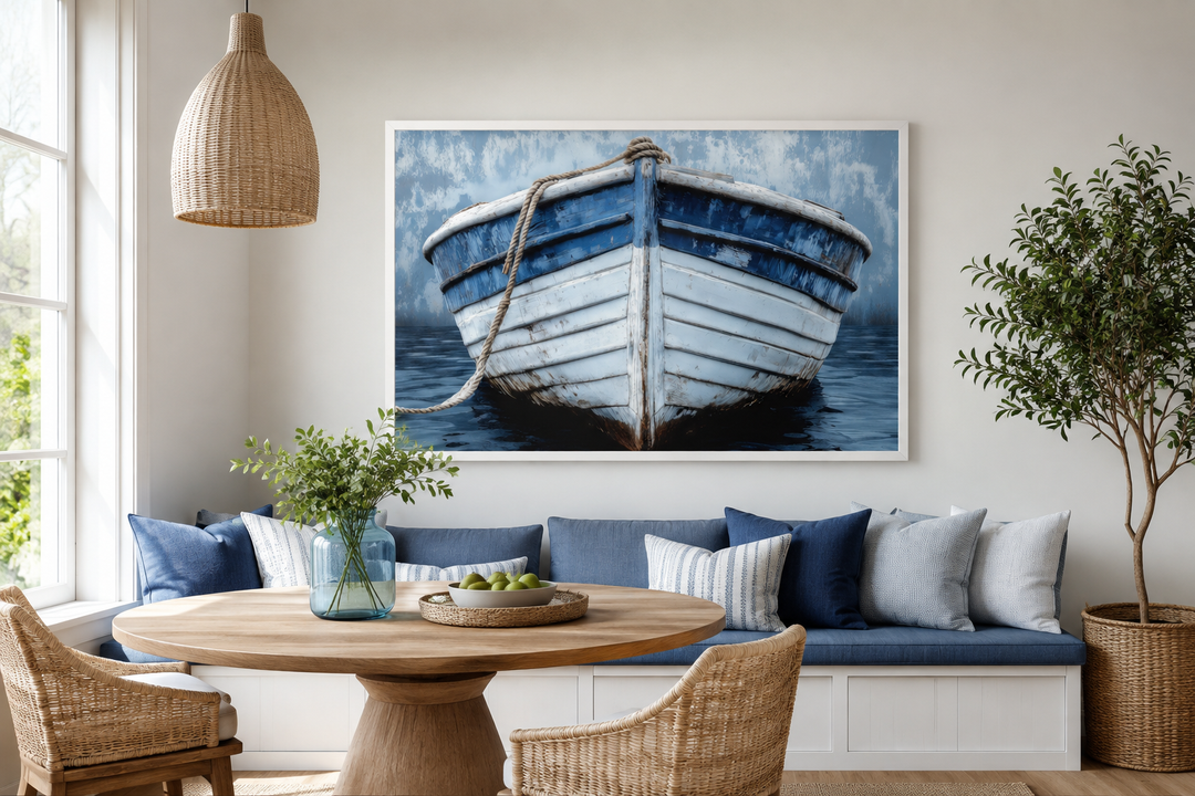 Rustic blue and white distressed boat wall art hanging in a coastal-style dining room.