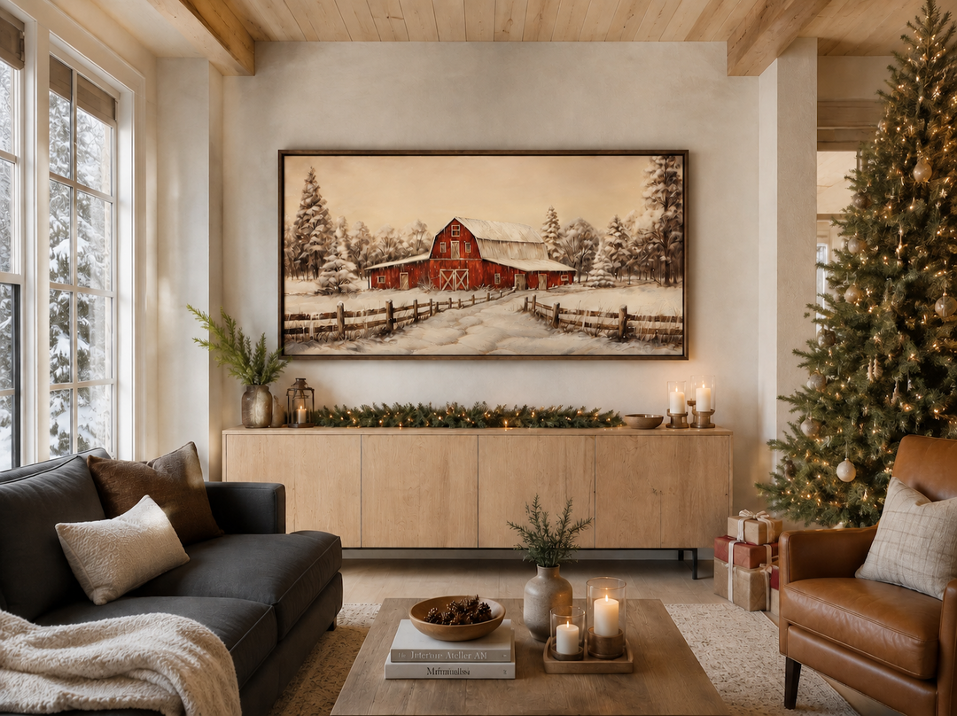 Framed canvas wall art of a red barn in a snowy winter landscape above a Christmas mantel.