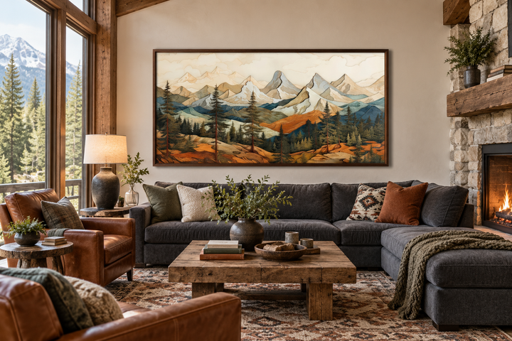 Rustic mountain wall art with layered wood panel effect above a sofa in a cabin-style living room.