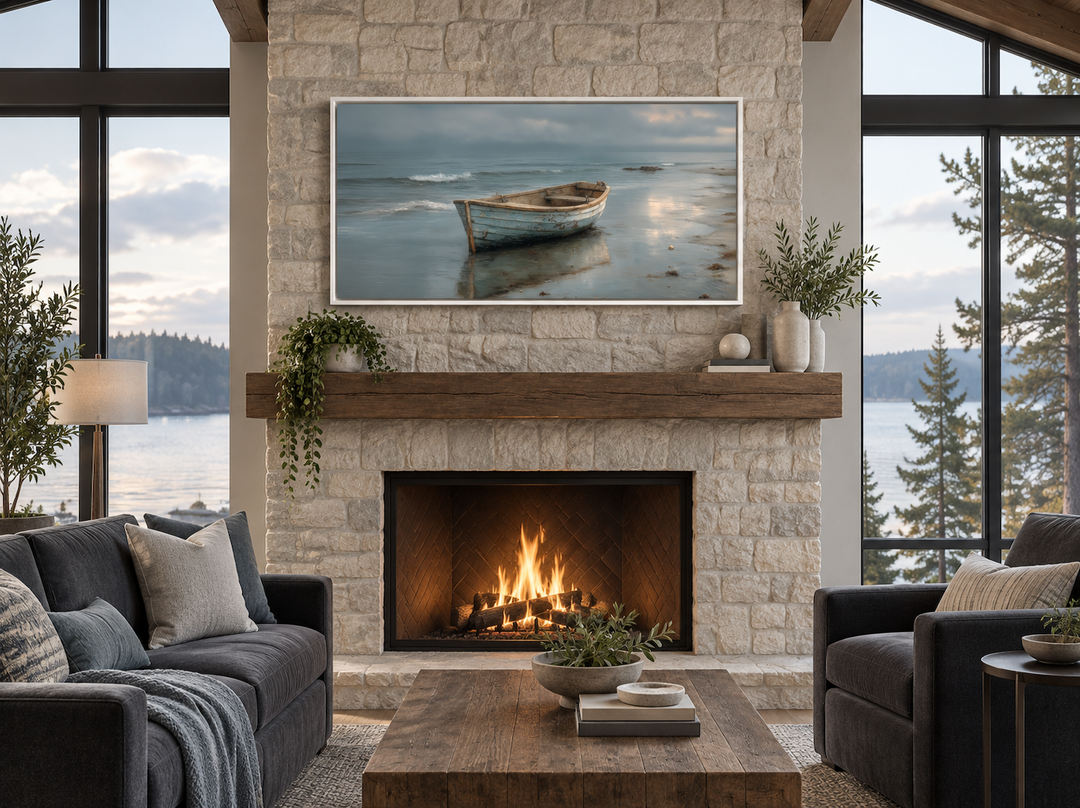 Rustic rowboat on beach coastal framed canvas wall art hanging above a stone fireplace.