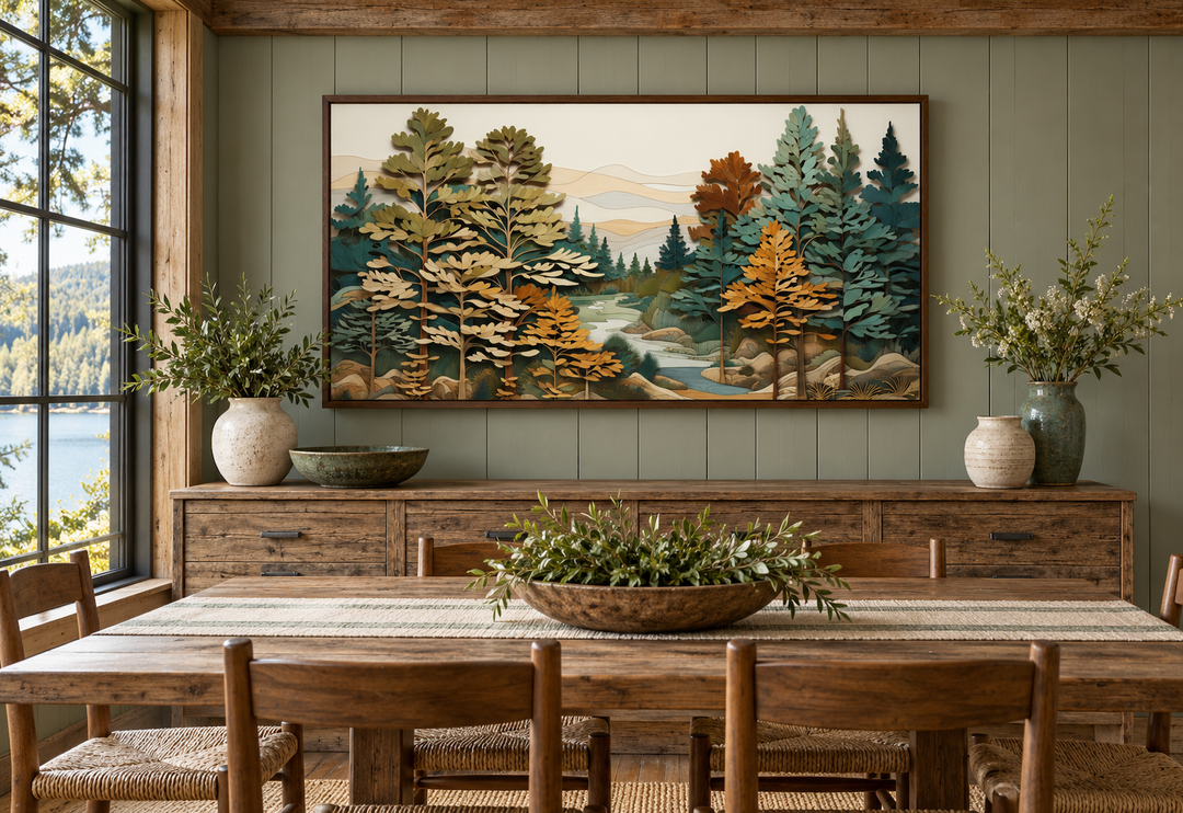 Layered wood wall art of a forest river scene hanging in a rustic dining room with wooden furniture.