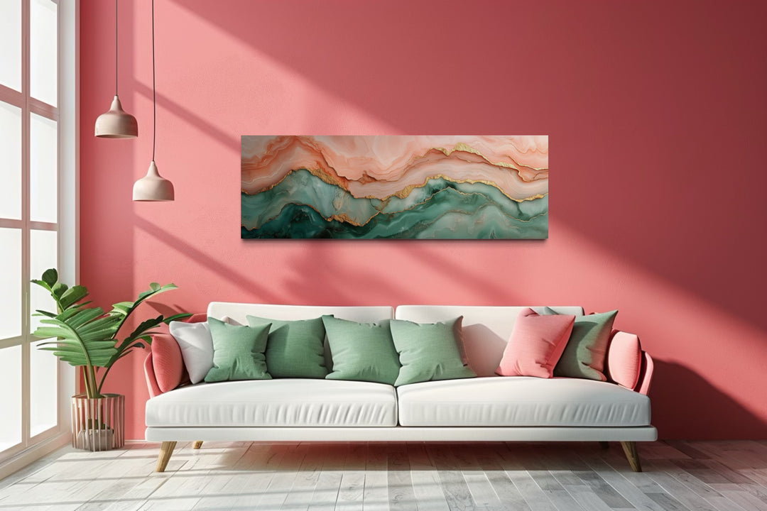 Sage green and blush pink abstract marble horizontal canvas wall art above a white sofa.