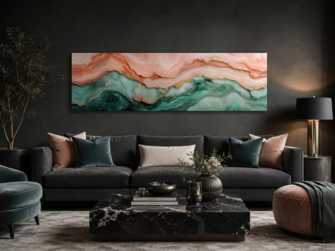 Sage green and blush pink abstract marble horizontal canvas wall art above a dark grey sofa.