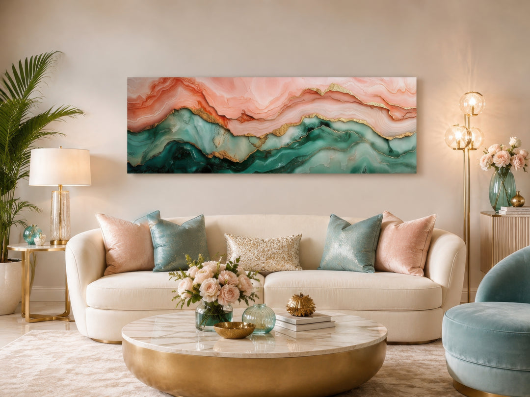 Sage green and blush pink abstract marble horizontal canvas wall art hanging above a white sofa.