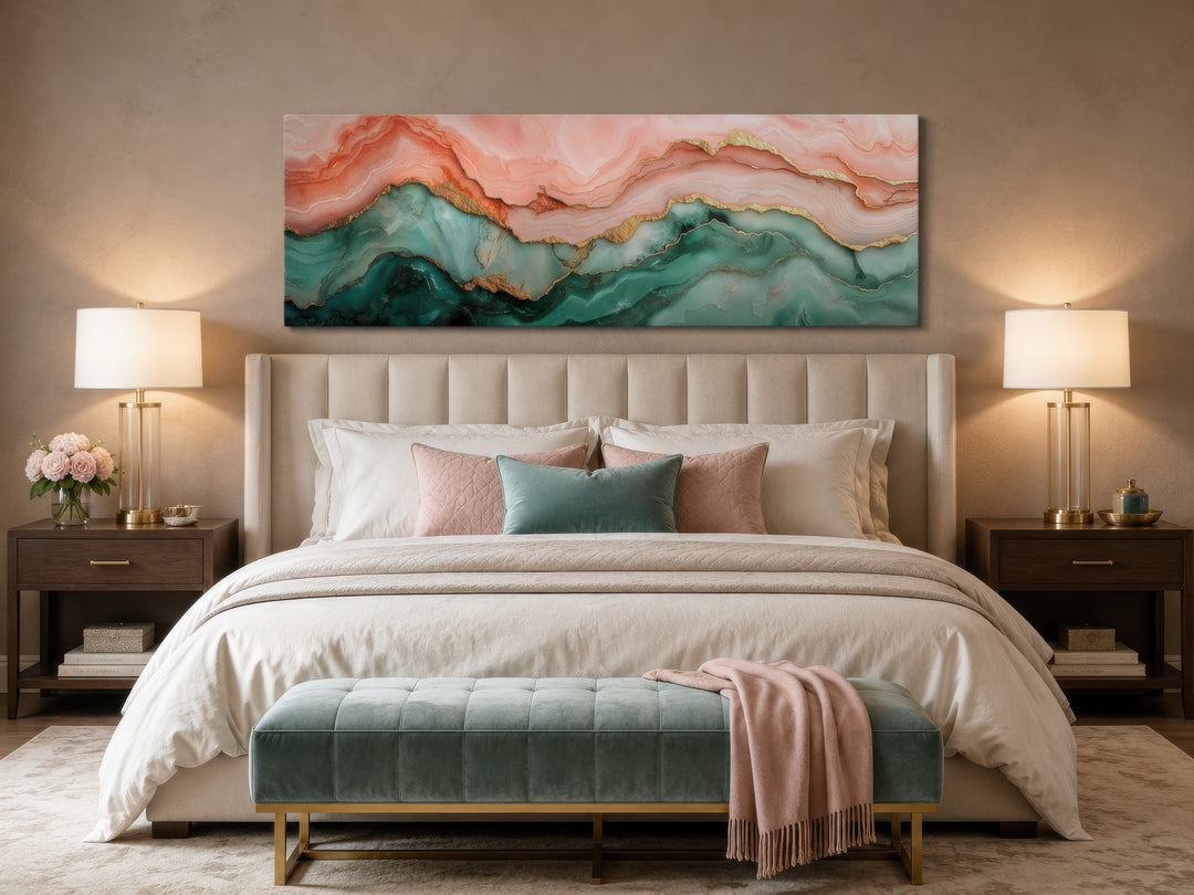 Sage green and blush pink abstract marble canvas wall art hanging above a bed in a bedroom.