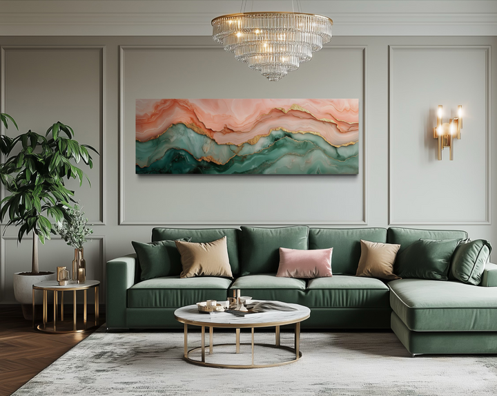 Sage green and blush pink abstract marble horizontal canvas wall art above a green velvet sofa.