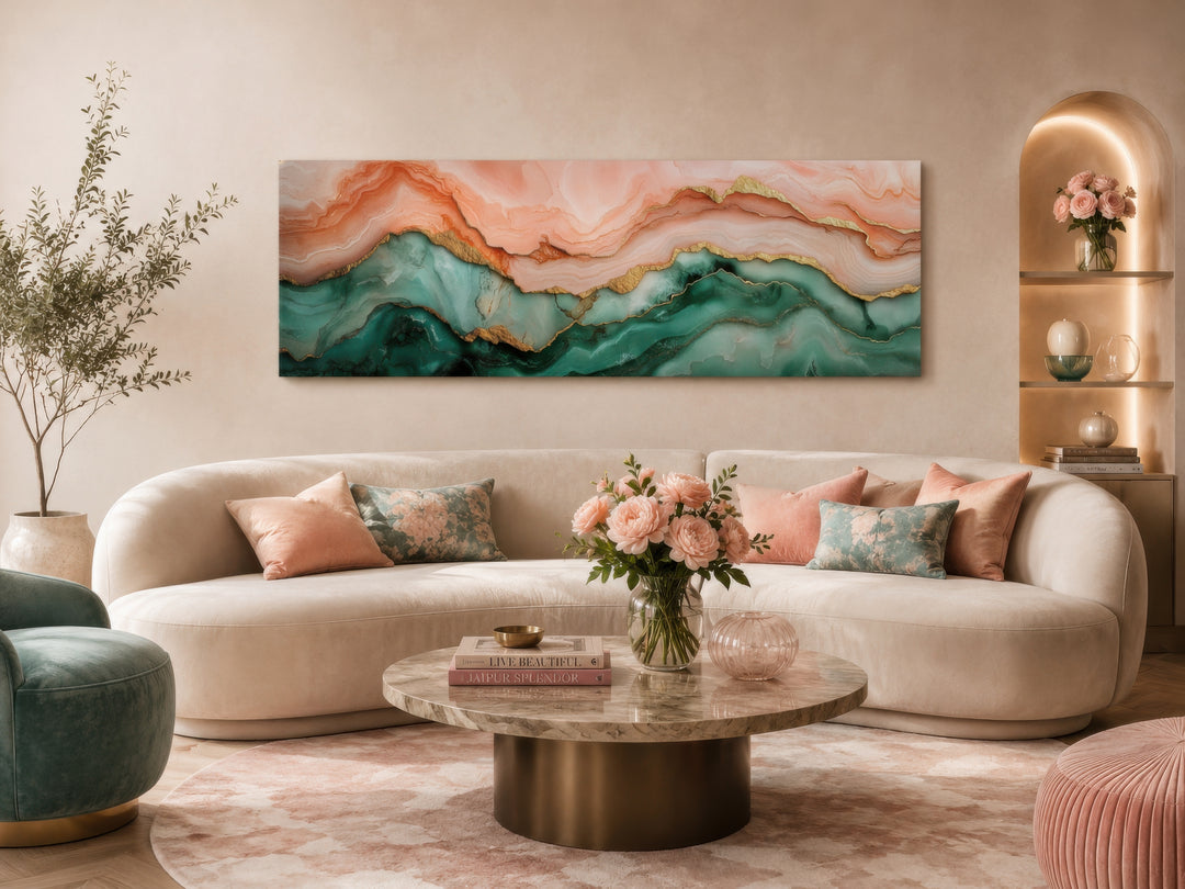 Sage green and blush pink abstract marble horizontal canvas wall art hanging above a curved sofa.