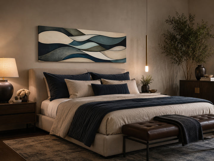Sage green and brown modern abstract horizontal framed wall art hanging above a bed.
