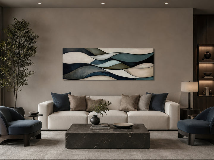 Sage green and brown modern abstract horizontal framed wall art hanging above a sofa in a room.